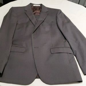 Joseph Abboud Mens Suit.Size 40reg Taupe in color.